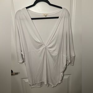 Oversized low cut white top